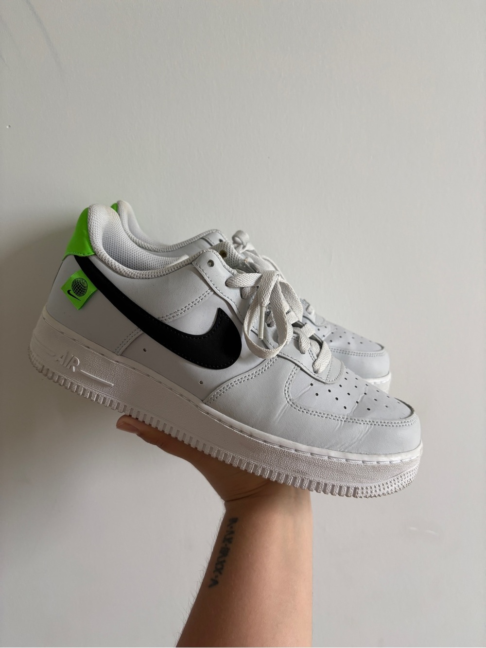 Nike White Sneakers with Black Swoosh and Neon Green Heel Accents